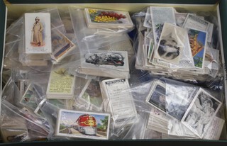 A quantity of part sets of cigarette cards 