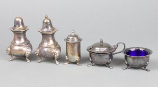 A three piece silver plated condiment set together with a silver plated salt and pepper