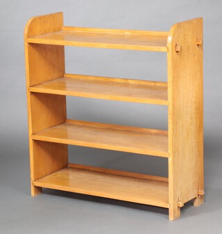 A 1930's style rectangular oak bookcase fitted 4 shelves 86cm h x 80cm w x 29cm d 