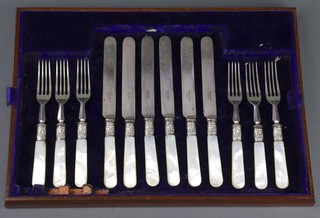 A set of 6 silver plated fish knives and forks with mother of pearl handles