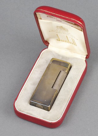 A Dunhill plated cigarette lighter