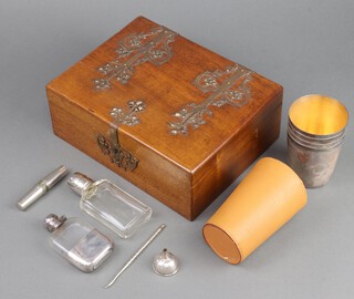 A brassbound Victorian box containing a plated hip flask and minor items