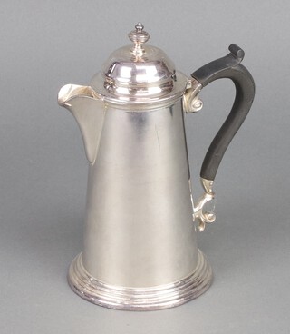 A Queen Anne style silver plated hot water jug 