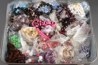 A small suitcase of costume jewellery