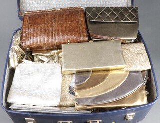 A suitcase of vintage handbags