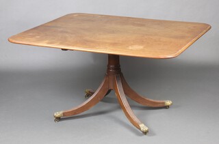 A 19th Century rectangular bleached mahogany snap top breakfast table on pillar and tripod supports