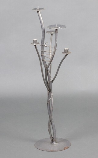 A grey painted metal 5 light floor standing candelabra 90cm