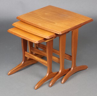 Mid-century, a nest of 3 teak interfitting coffee tables 46cm x 52cm x 42cm (largest)