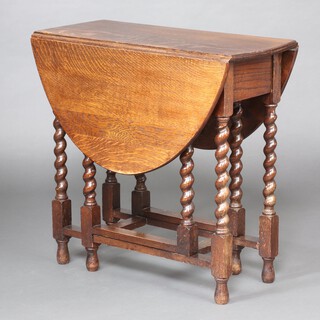 A 1930's light oak oval drop flap gateleg table on spiral turned supports 74cm h x 75cm w x 33cm d (sun bleached)