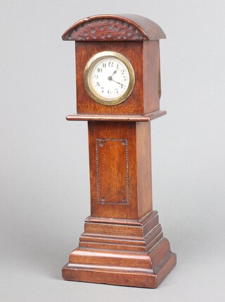 A Swiss timepiece with 5cm silvered dial, Arabic numerals,  in the form of a miniature longcase clock 31cm x 12cm x 9cm (no key) 