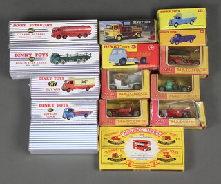 Five Models of Yesteryear, Y1, Y2 x 2, Y4, Y8 together with a collection of Reproduction Dinky and Matchbox toy cars, boxed, all contained in a blue plastic crate