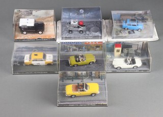 Seven James Bond 007 model cars, Triumph Stag,  MGB, Moonbuggy, Landrover Defender, Lada, Toyota 2000GT and a ZAZ-965A