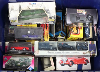 A collection of toy cars contained in a blue plastic crate