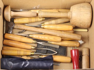 Sixteen various turning chisels, a carvers mallet etc