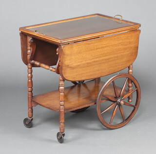 A 1960's mahogany 2 tier drop flap tea trolley 73cm h x 72cm w x 46cm d (contact marks in places)