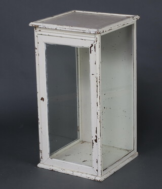 A white painted glazed pedestal display cabinet 84cm h x 44cm w x 46cm d (1 pane cracked)