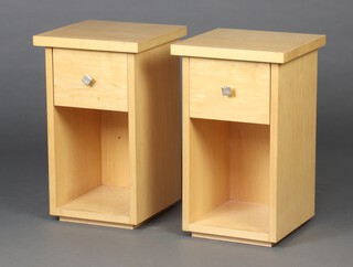 A pair of maple finished bedside cabinets, fitted a drawer above recess 50cm h x 30cm w x 30cm d 