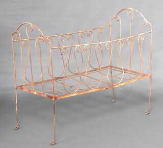 A Victorian wrought iron folding cot  103cm x 122cm x 59cm 