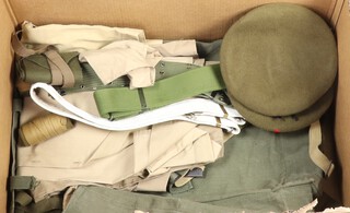 Two berets, 3 webbing belts, webbing haversack, shirt, putties 