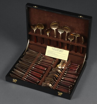 A canteen of Thai gilt bronze flatware, contained in an ebonised canteen box 