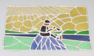 A rectangular stained glass panel decorated a seated figure 50cm x 84cm (some cracks in places) 