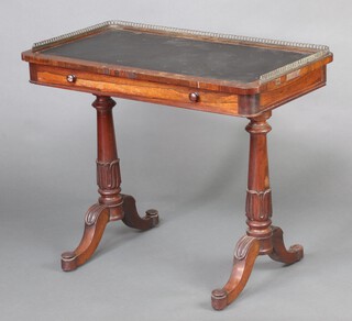 A William IV rosewood writing table with pierced brass 3/4 gallery with inset writing surface above 1 long drawer, raised on turned supports 76cm h x 92cm w x 51cm d 