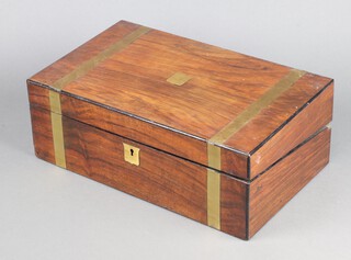 A Victorian walnut and brass banded writing slope with hinged lid, the top with brass shield plaque marked John T Wells 14cm h x 40cm w x 24cm d 