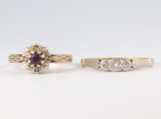 A yellow gold testing as 18ct 3 stone diamond ring size P and a 9ct yellow amethyst and diamond cluster ring, size M 1/2, 4.9 grams 