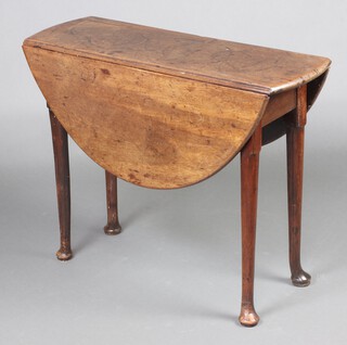 A Georgian oval mahogany drop flap tea table, raised on club supports 70cm h x 89cm w x 30cm when closed x 96cm when open 