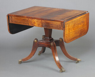 A Regency rosewood and inlaid brass pedestal sofa table fitted 2 drawers, raised on chamfered square column with triform base and splayed legs ending in brass paw feet  76cm h x 92cm w x 65cm d 