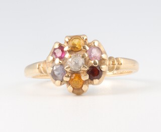 A yellow gold, testing as 9ct, multi gem stone ring 3.2 grams, size O 