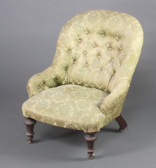 A Victorian metal framed tub back chair upholstered in green buttoned material, raised on turned supports 72cm h x 54cm w x 50cm d (seat 26cm x 27cm) 