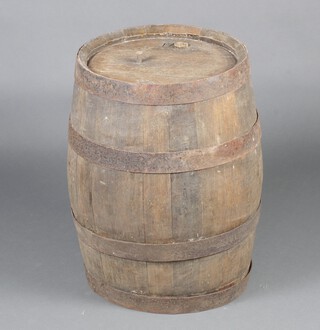 A coopered and iron banded barrel  53cm h x 43cm diam. 