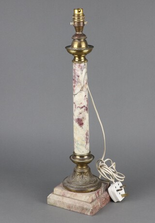 A polished granite oil lamp base with gilt metal mounts converted to a table lamp 48cm h x 15cm 