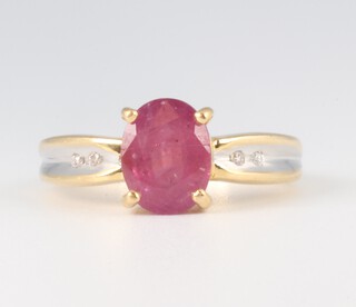 An 18ct yellow gold diamond and ruby ring, 5.3 grams, size N 