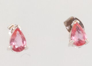 A pair of white gold (testing as 18ct) pear cut pink gem ear studs, 0.5ct each, 8mm