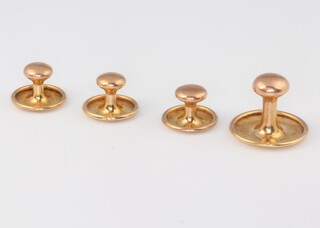 Four 9ct yellow gold dress studs, cased, 2.7 grams 