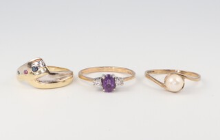 A 9ct yellow gold amethyst and diamond ring size N 1/2, a ditto pearl ring size N 1/2, 3 grams and a 14ct yellow gold gem set ring 2.8 grams size L 