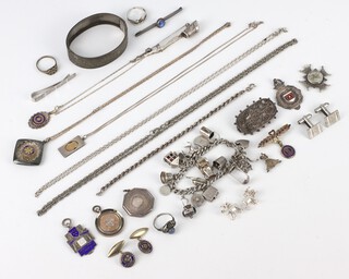 A silver bangle and minor silver jewellery, gross weight 213 grams 