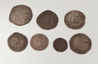 A collection of English hammered coinage, most badly rubbed and clipped flan to include Charles I shilling and sixpence, James I sixpence, Elizabeth I sixpence, half groat and penny and a George II sixpence