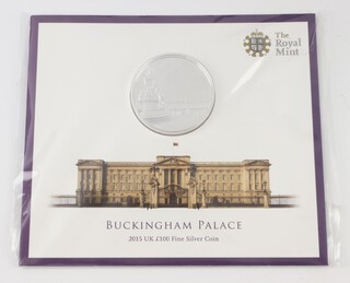 A 2015 Buckingham Palace one hundred pound fine silver coin 