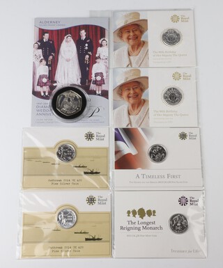 Six twenty pound fine silver coins together with a 2007 five pound Alderney coin 