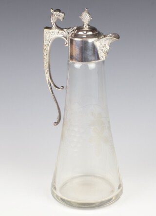 An Edwardian silver plated mounted ewer with engraved vinous decoration and dragon handle 30cm 