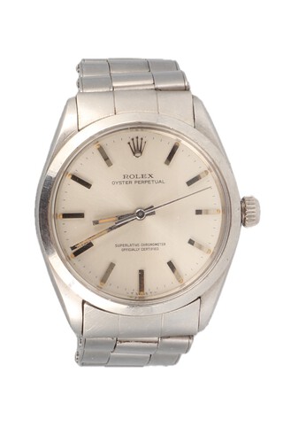 A gentleman's Rolex steel cased Oyster Perpetual wristwatch with silvered dial, 32mm, with original Rolex strap, the bracelet numbered 6635, in working order 