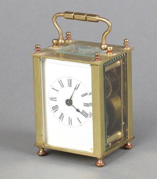 A 20th Century French carriage clock with 4.5cm dial, contained in a gilt metal case, complete with key 9cm x 6cm w x 5cm d