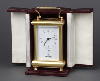 A 20th Century French 8 day carriage timepiece with 5cm enamelled dial, Roman numerals, the dial marked Crockfords, 11cm x 8cm x 6cm, complete with a plush box  