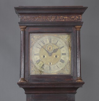 James Drury, an 18th Century five pillar London longcase clock movement, the 27cm dial with gilt spandrels, silvered chapter ring and Roman numerals, with minute dial and calendar aperture contained in an oak case, with key, pendulum and weights, 211 cm (not in working order)