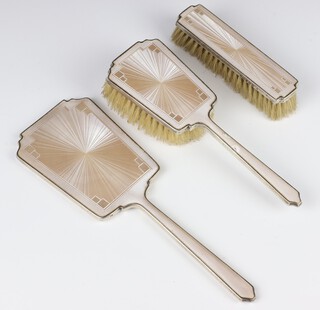 A silver Art Deco guilloche enamel brush set comprising hand mirror, clothes brush, hair brush, Birmingham 1939/40 