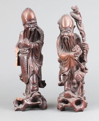 A pair of Chinese carved root wood figures of standing sages 36cm (1f)