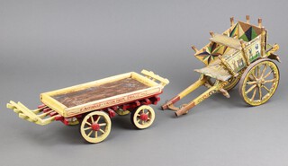 A Continental scratch built cart with panels decorated scenes 19cm x 29cm x 17cm together with a flat bed cart marked F Raybould-Falcon Farm Enville 9cm x 31cm x 13cm 